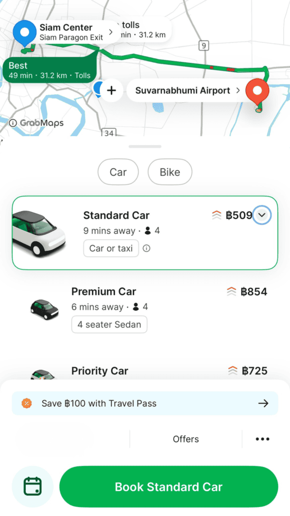 Grab app showing car options, prices, and toll information for a ride in Bangkok