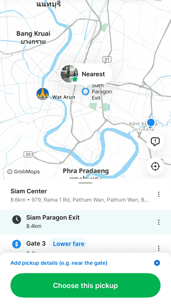 Grab app map showing pickup point selection near Siam Paragon in Bangkok