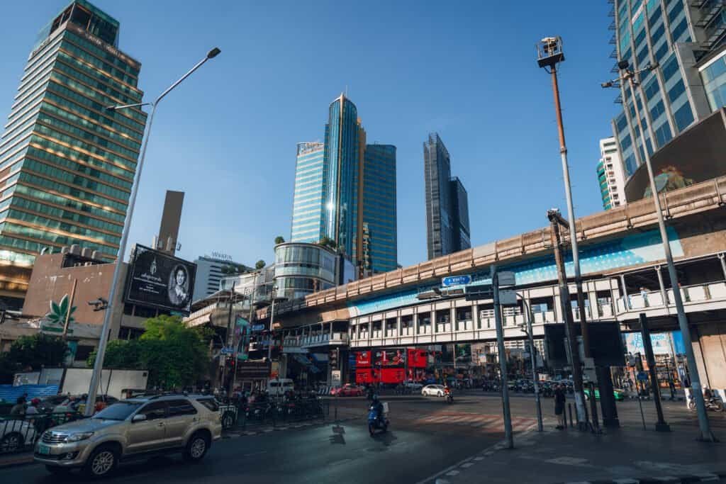 Asok intersection with BTS tracks and high-rise buildings in Bangkok